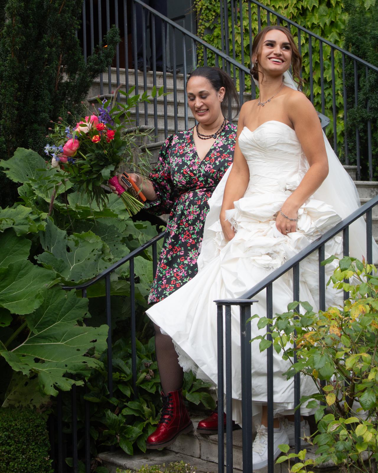 Elizabeth helping a bride down the stairs!